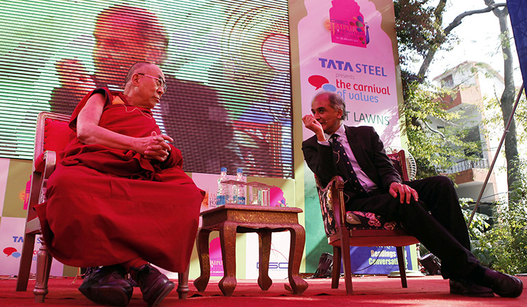Pico Iyer with the Dalai Lama, one of his heroes, at a session of the Jaipur Literature Festival in 2013 | Getty Images