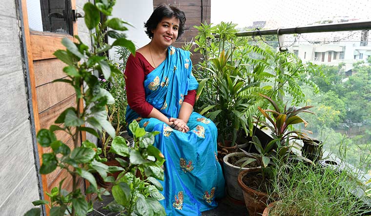 Green corner: Nasreen in her balcony, where she has recreated a garden of her childhood | Arvind Jain