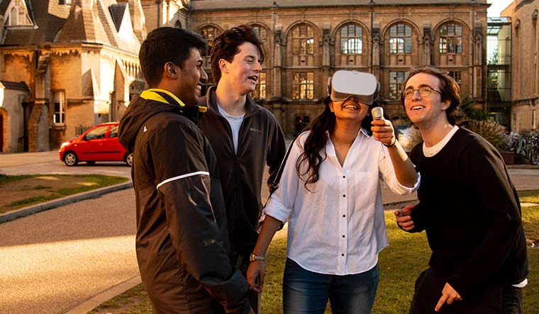 Combined effort: The Project Dastaan team testing out VR glasses.