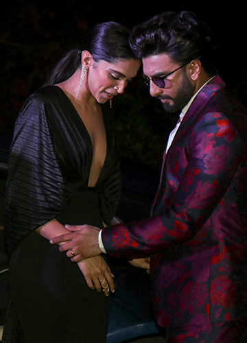 Love birds: Ranveer and Deepika at an awards function last year | PTI