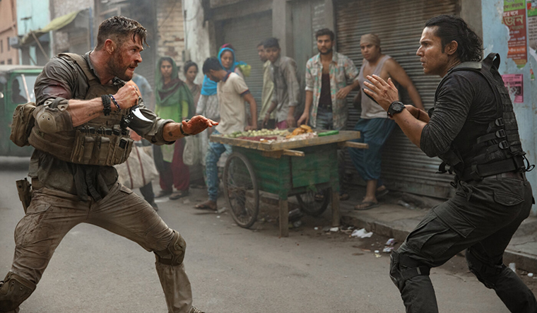 Blood and thunder: Chirs Hemsworth and Randeep Hooda in Extraction. Apart from Pankaj Tripathi, Hooda is another Indian presence in the movie
