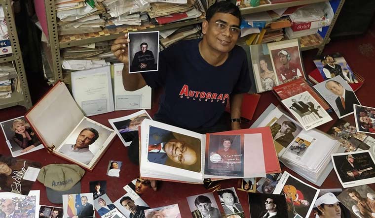 Precious collection: Autograph collector Santosh Kumar Lahoti with his collection.