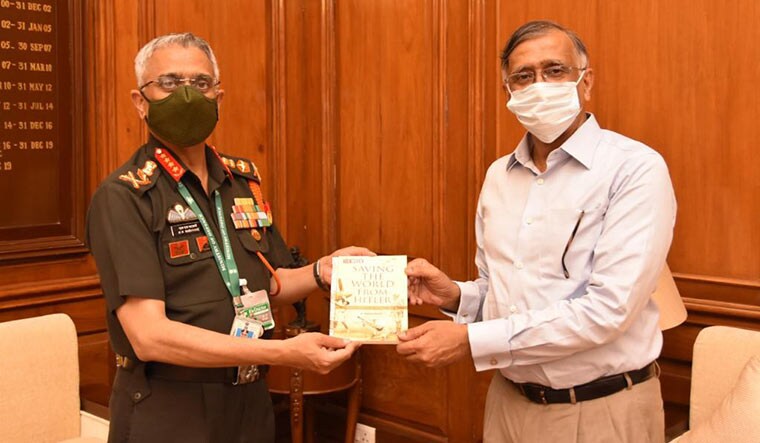 Chief’s nod: Army Chief General M.M. Naravane receives a copy of the book from R. Prasannan.