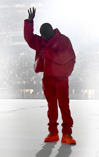 Ye, the showman: West sports a full face mask at a Donda listening event in Atlanta, USA | Getty Images