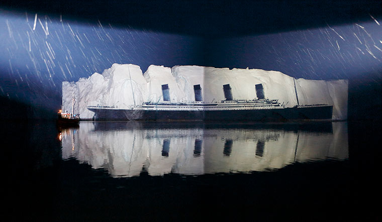 Ice art: The Titanic projected onto the iceberg where it was wrecked.