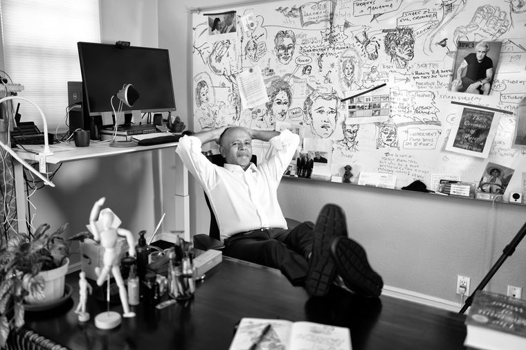 Man and his modes: Verghese at his writing desk, with the whiteboard, where he doodled the characters and storyline of The Covenant of Water, in the background | Christopher Michel