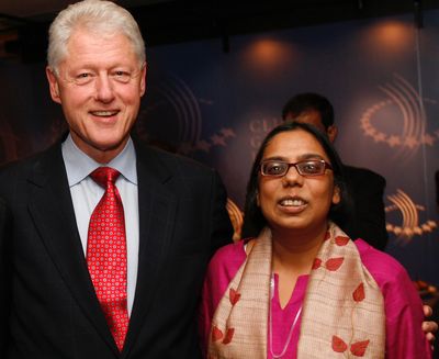 With former US president Bill Clinton when she was presented with the Clinton Global Citizen Award in 2009.