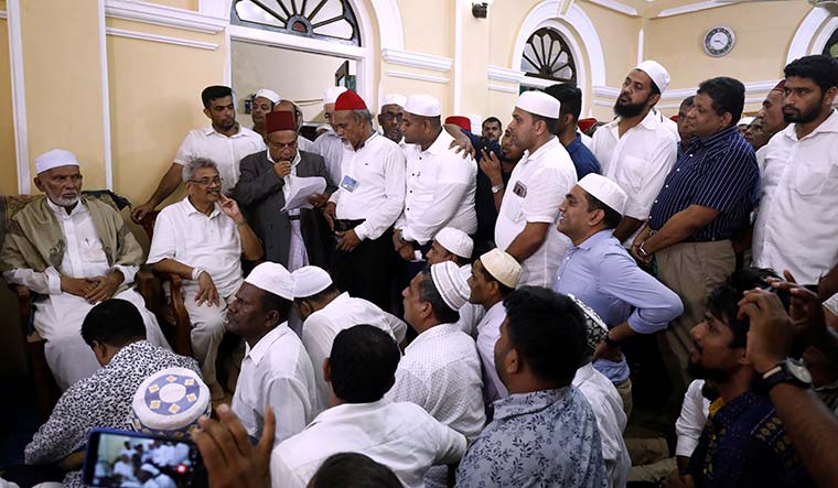 Friends, lankans, countrymen: Gotabaya Rajapaksa interacts with Muslims at a mosque in Beruwala, Sri Lanka | Reuters