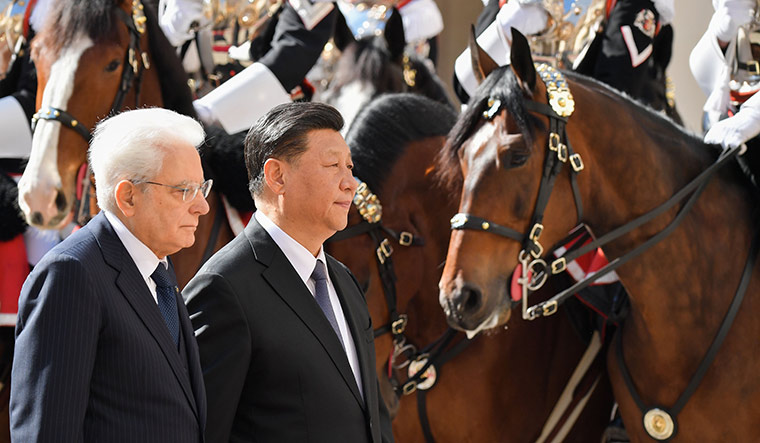 New frontiers: Chinese President Xi Jinping reviews an honour guard along with Italian President Sergio Mattarella. Italy joined the Chinese BRI during Xi’s two-day visit to Italy last month | Getty Images