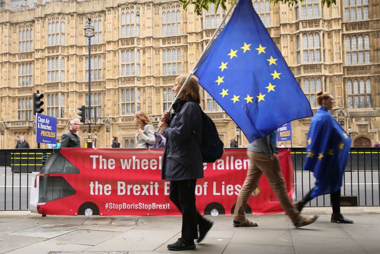 Last stand: Anti-Brexit activists protesting outside the parliament building in London | AFP