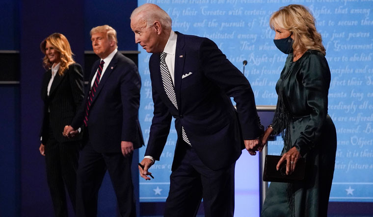 Pitched battle: Melania and Donald Trump with Joe and Jill Biden after the first presidential debate in Cleveland on September 29 | AP