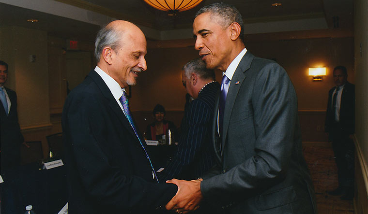 Blue blood: M.R. Rangaswami, chairman and founder of Indiaspora, a community organisation, with former president Barack Obama.