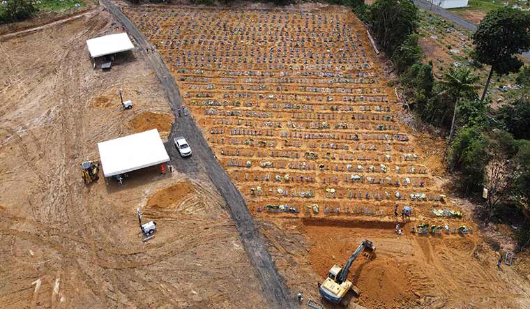 Final journey: The Nossa Senhora cemetery in Manaus has seen a surge in the number of new graves after the outbreak of Covid-19 | AFP