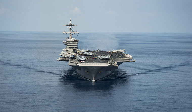 Flexing muscles: American aircraft carrier USS Carl Vinson transits the South China Sea | Reuters