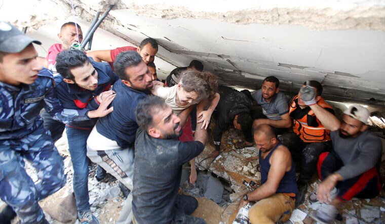 Caught in the crossfire: Rescue efforts after an Israeli air strike in Gaza | REUTERS
