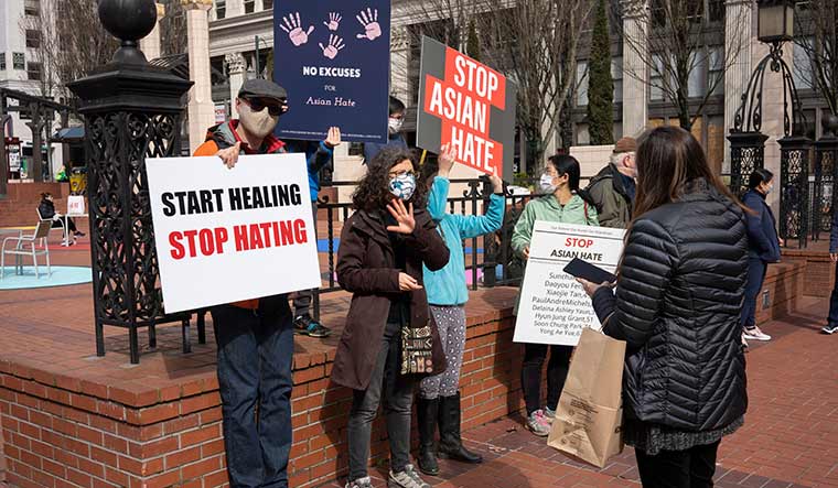 Fighting back: Demonstrators in downtown Portland denounce violence against Asian Americans after the Atlanta spa shooting.