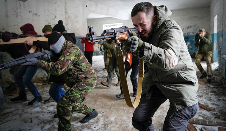 Fighting spirit: Local residents in Ukrainian capital Kyiv undergo military training as Russian forces encircle the country | AP