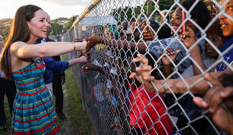 Crown, frown: The duke and duchess of Cambridge visit Trench Town, Jamaica, during their week-long Platinum Jubilee Royal Tour of the Caribbean. This photograph was criticised for being tone-deaf, evoking images of imperial arrogance and racial discrimination | Getty Images