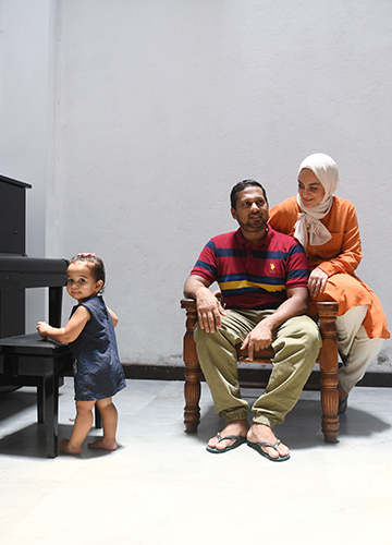 Anxious days: Hizbullah with his wife, Maram Khalifa, and child at home | Bhanu Prakash Chandra