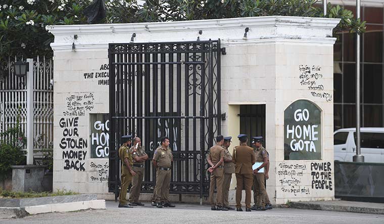 Rage of the people: The police guarding the president’s residence in Colombo after it was stormed by protesters | Bhanu Prakash Chandra