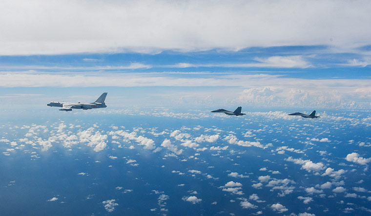 Airborne threat: Chinese military aircraft during a combat drill near Taiwan on August 7 | AP