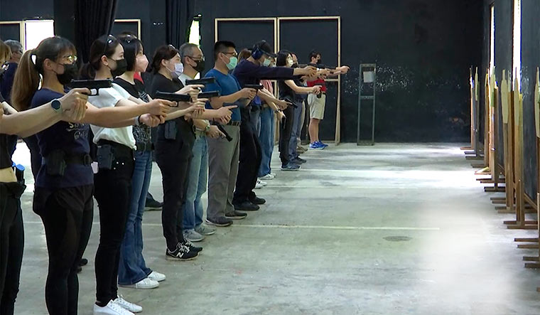 People power: Civilians undergo combat training in Taiwan | AP