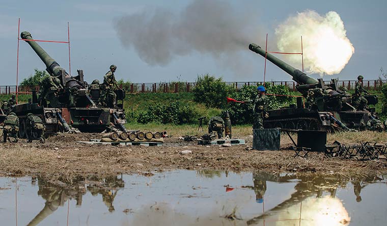 Ready to roll: Taiwanese artillery fire live rounds during a military exercise designed to prepare the island's forces for an attack by China | AP