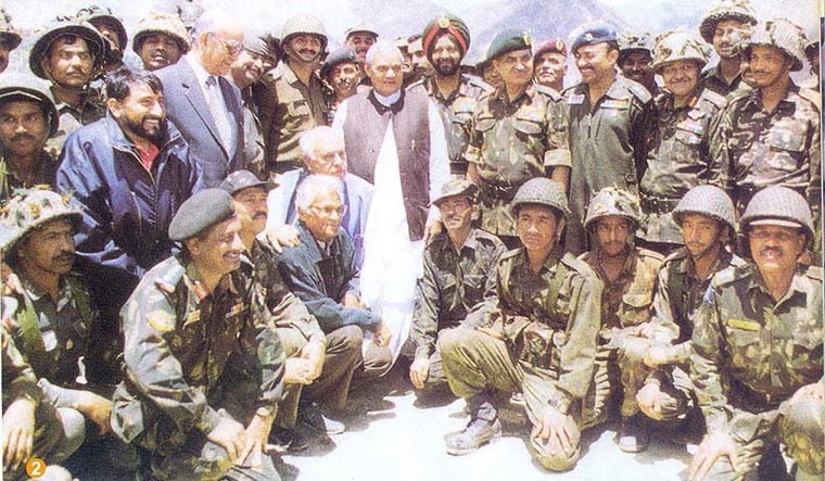 Leading from the front: Vajpayee with an Army contingent after India won the Kargil war.
