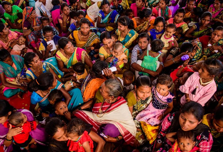 A shot at survival: Women with their children wait for their turn at the medical camp in Jawhar. The crisis in Palghar had first attracted attention in 2006, when 718 malnourished children died.