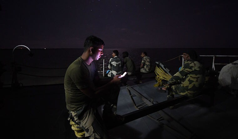 Brief respite: Jawans spending leisure time on the deck of the floating border outpost (FBOP) at Koteshwar, Kutch, Gujarat.