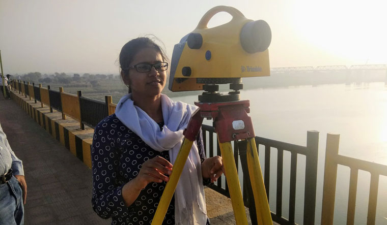 Tall task: Swarnima Bajpai does high-precision levelling on the Jhansi-Kanpur highway