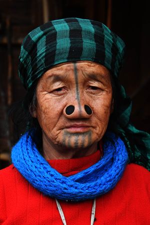 Marked for life: Ya Sung got her nose plugged at seven or eight, and face tattooed at 14 or 15 | Salil Bera