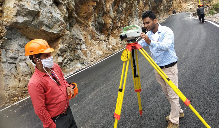 Charting progress: Sagar Gurung does high-precision levelling on the Uttarkashi-Gangotri route