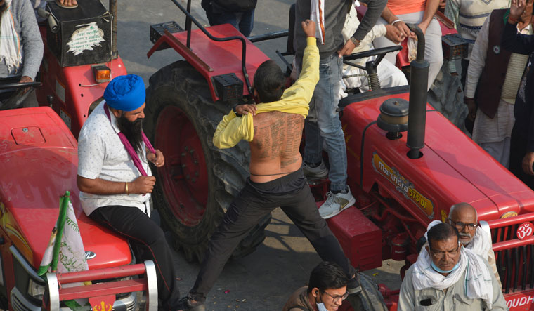 Ink and ire: A farmer with his demands tattooed on his back | Arvind Jain
