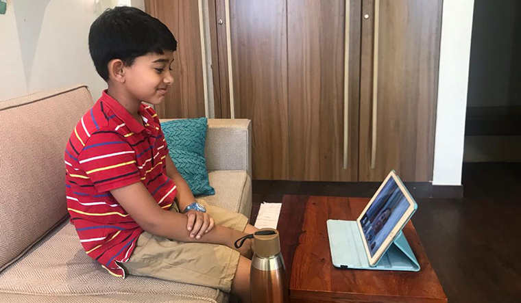 Learning curve: Arjun, a fourth grader, attends a virtual class in Lucknow