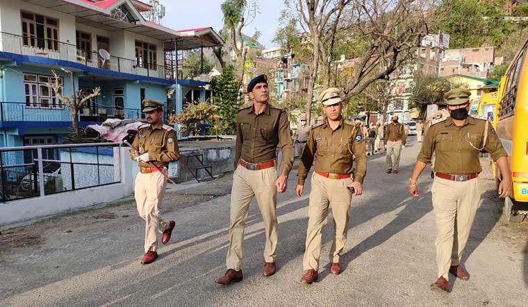 Country first: Bilaspur DSP Ajay Thakur (left) is a former captain of the kabaddi national team.