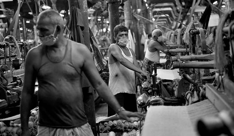 Back in action: Workers returned in full strength to jute mills in West Bengal on June1 after a gap.