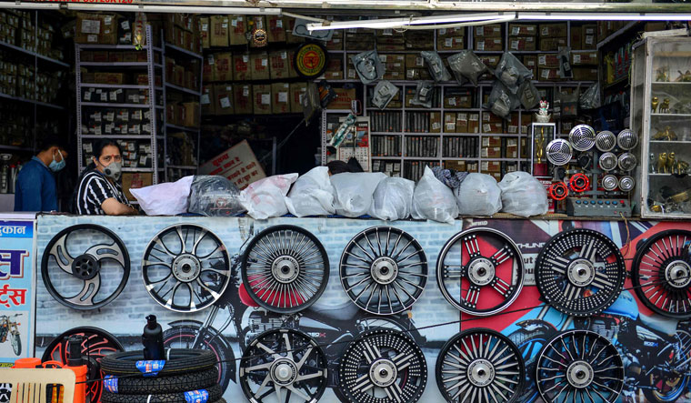 testing times: An automobile parts shop in Prayagraj | AFP