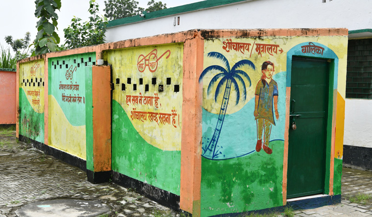 Writing’s on the wall: A toilet for girls at the government primary school in Jayapur, Varanasi | Arvind Jain