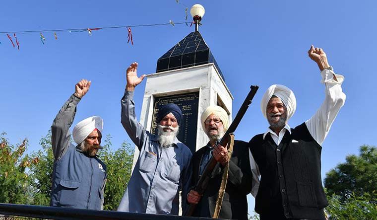 Brave hearts: Bhagwan Singh, Ishar Singh, Basant Singh and Raghubir Singh in front of the memorial at Shaheedgarh | Arvind Jain