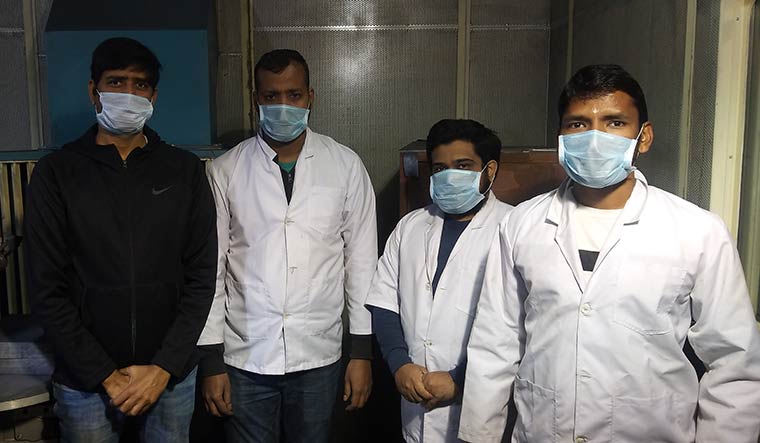 The team: (left to right) Dr Anup Kumar Keshri, Aminul Islam, Biswajyoti Mukherjee and Krishna Kant Pandey. Mukherjee died of Covid-19 complications in April