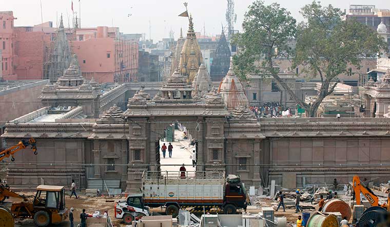 Faith, brick by brick: Construction work at the Kashi Vishwanath temple complex.