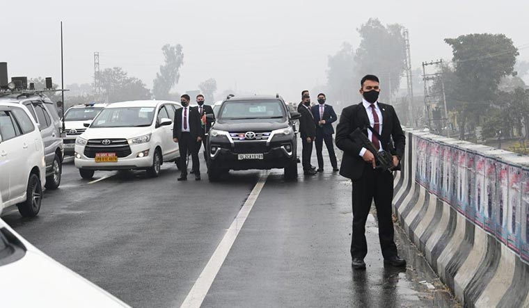 Always alert: Security personnel stand guard as Prime Minister Narendra Modi’s cavalcade got stuck on a flyover, in Ferozepur in Punjab | PTI