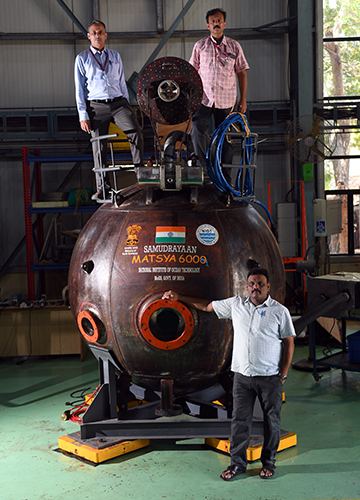 The Art and the artists: (Clockwise from left ) NIOT scientists R. Ramesh, S. Ramesh and N. Vedachalam with the prototype of the human quarters of Matsya 6000.