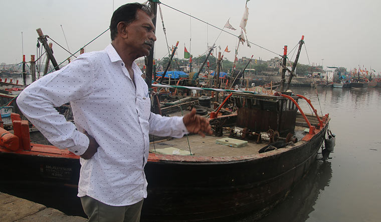High risk, low reward: Jivanbhai Jungi, from Porbandar, says fishing is not a lucrative business any more because of adverse weather and cyclones | Janak Patel