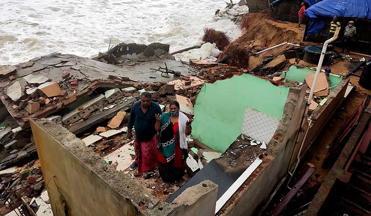 Taken by the sea: A house destroyed by coastal erosion at Vettukadu, Thiruvananthapuram, Kerala | R.S. Gopan