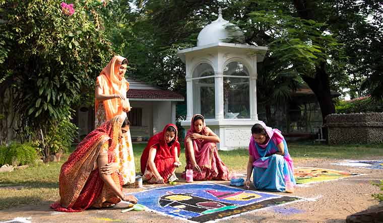 Picture of contentment: Women celebrating Diwali at Mahdi Bagh.