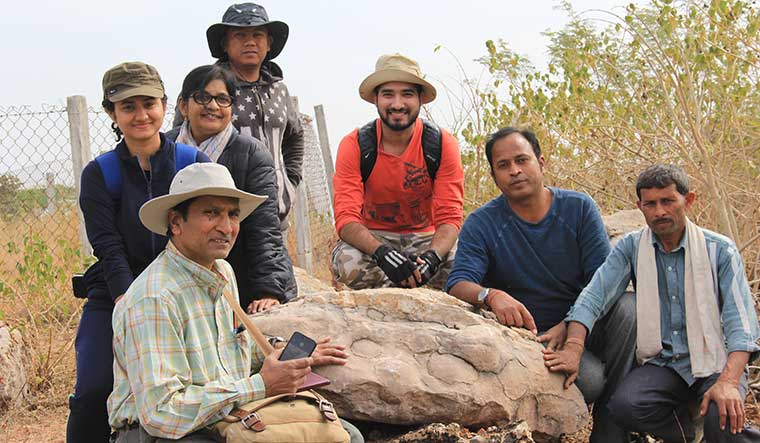 Rare find: Delhi University researchers led by Guntupalli V.R. Prasad (sitting, left), Harsha Dhiman (standing, first from left) and Vishal Verma (sitting, second from right) at the Fossil Park in Dhar.