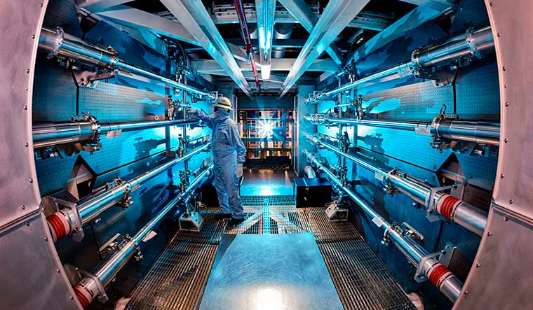 Amazing tech: A technician reviews an optic inside the preamplifier support structure at the Lawrence Livermore National Laboratory in Livermore, California.