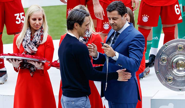 Win-win: Former bayern munich head coach niko kovac (left) and christian seifert at the victory ceremony at the end of the 2018-19 season | Getty Images